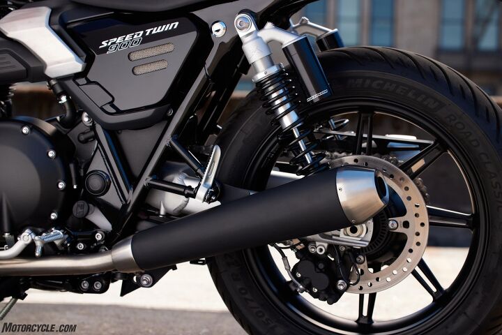 The simple addition of piggyback reservoirs for the twin shocks is a definite improvement from the previous Speed Twin. Here you can also see the new rear wheel and aluminum swingarm.